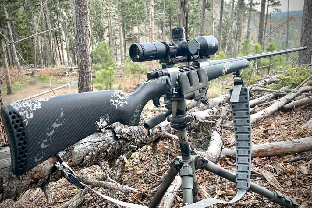 Weatherby Ultralight Mark V Backcountry 2.0 TI on tripod with trees