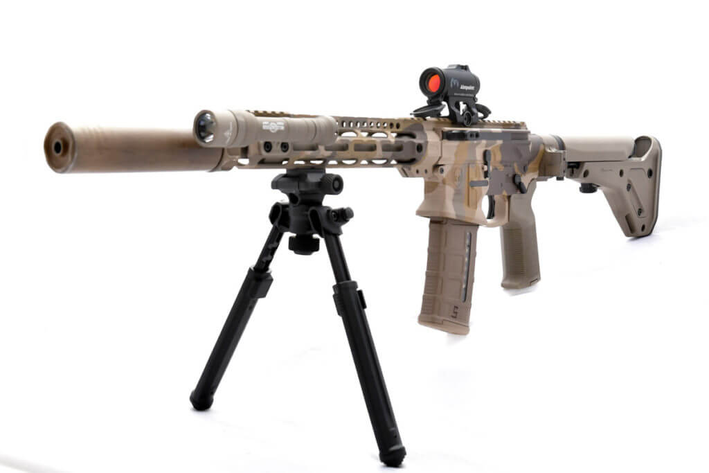 Civilian Defensive Rifle set up for short range shooting with a red dot.