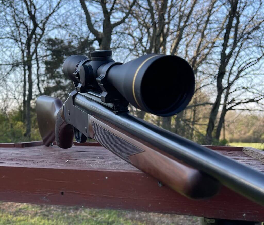 Henry Single Shot Rifle in .243 Winchester topped with a Leupold Scope.