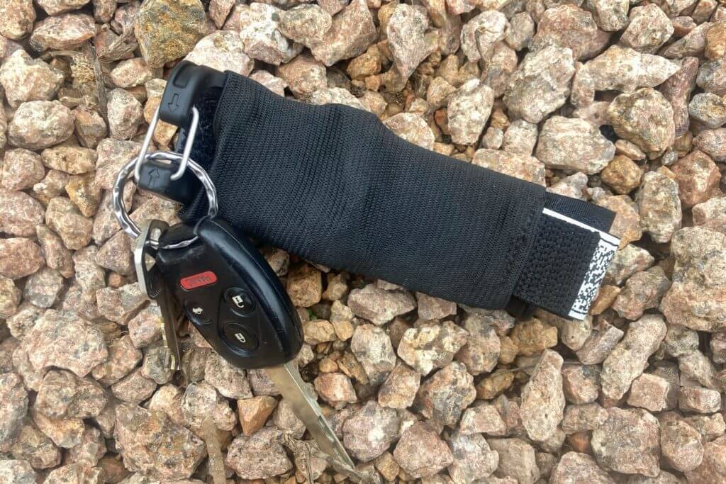 SnakeStaff Systems ETQ tourniquet used as a keychain.