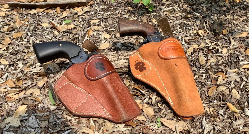 Rybka holsters with revolvers in them 