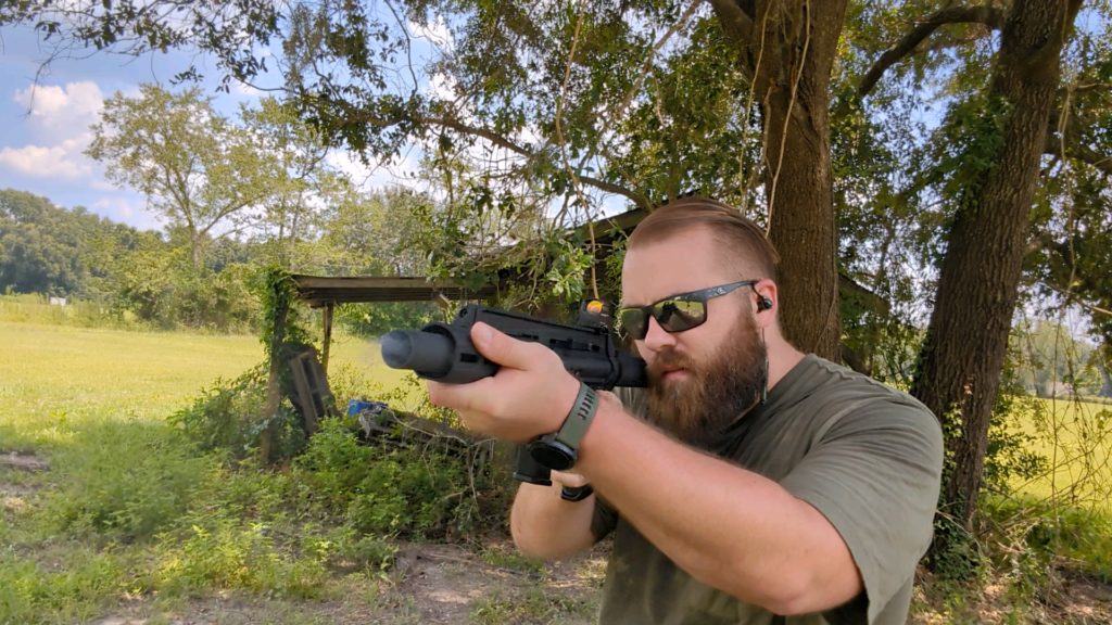 Shooter using the Extar EP45 outside in the shade of a tree
