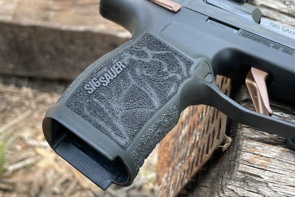 SIG P365-XL Comp featuring a rose laser engraved into the stippling pattern of the frame
