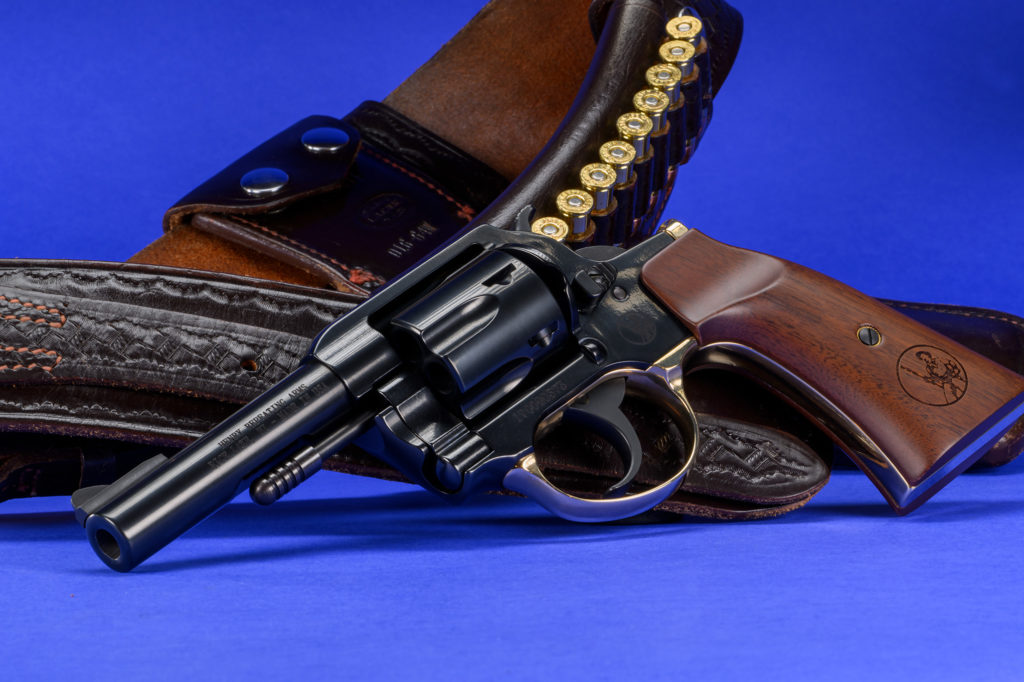 Henry .357 mag revolver shown with leather gun belt and ammunition