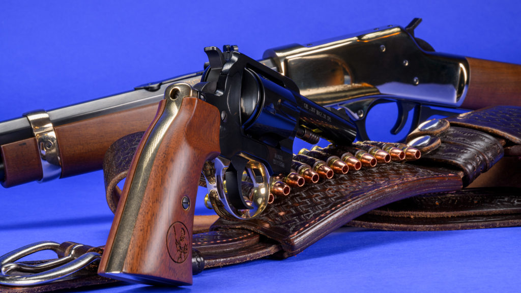Henry Big Boy revolver shown with Henry carbine and gun belt.