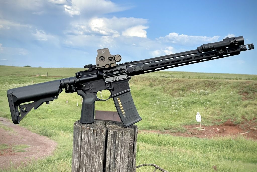 Springfield Armory SAINT Victor with a Law Tactical folder overlooking the pasture out on the farm